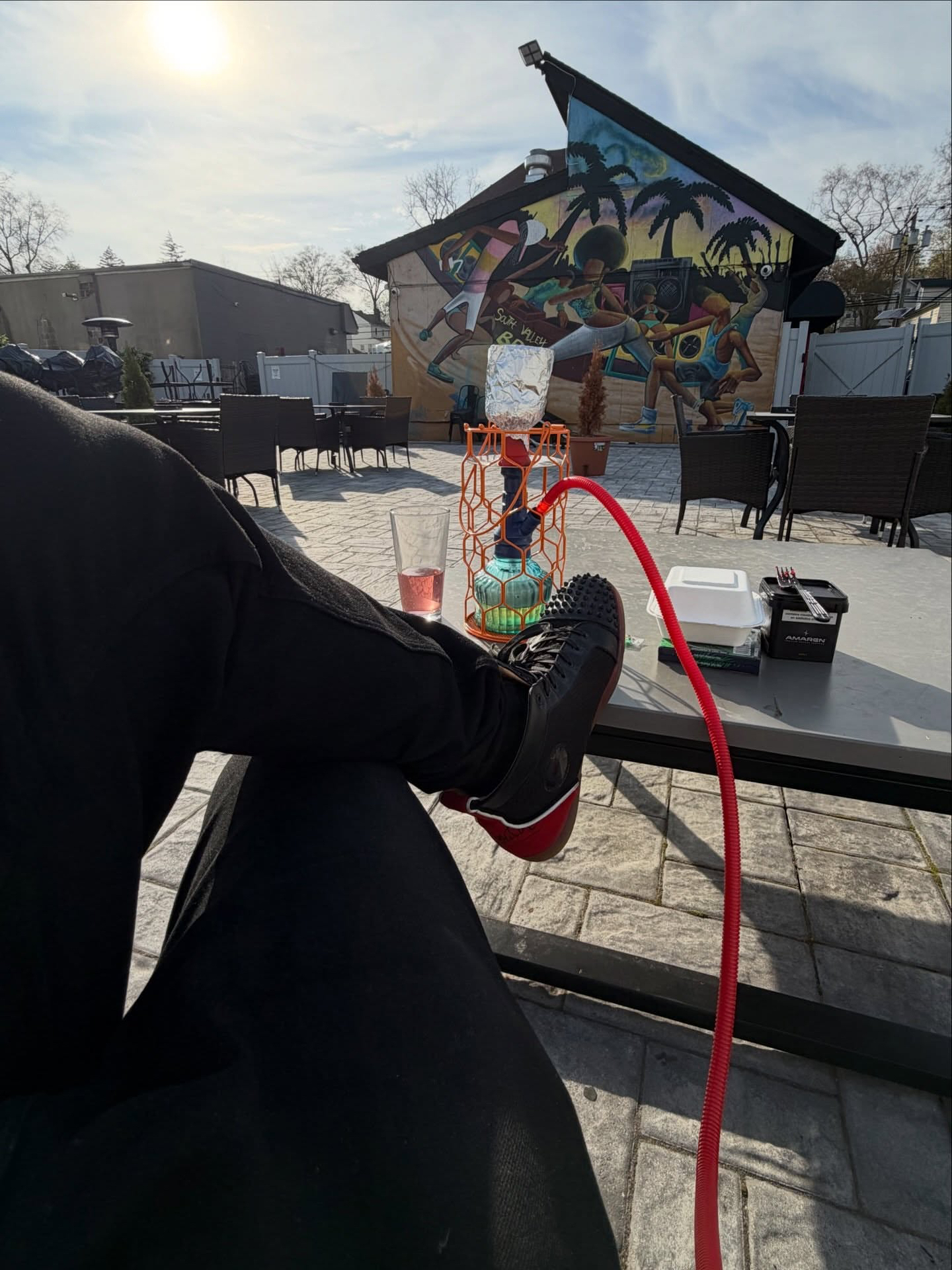Golden hour at Heroes Hookah patio — set the scene for your private event